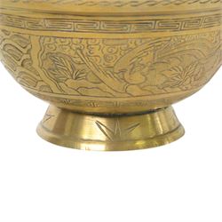 Chinese brass bowl, decorated to the outside with dragons,  upon a circular base, cast seal mark to base, D26cm
