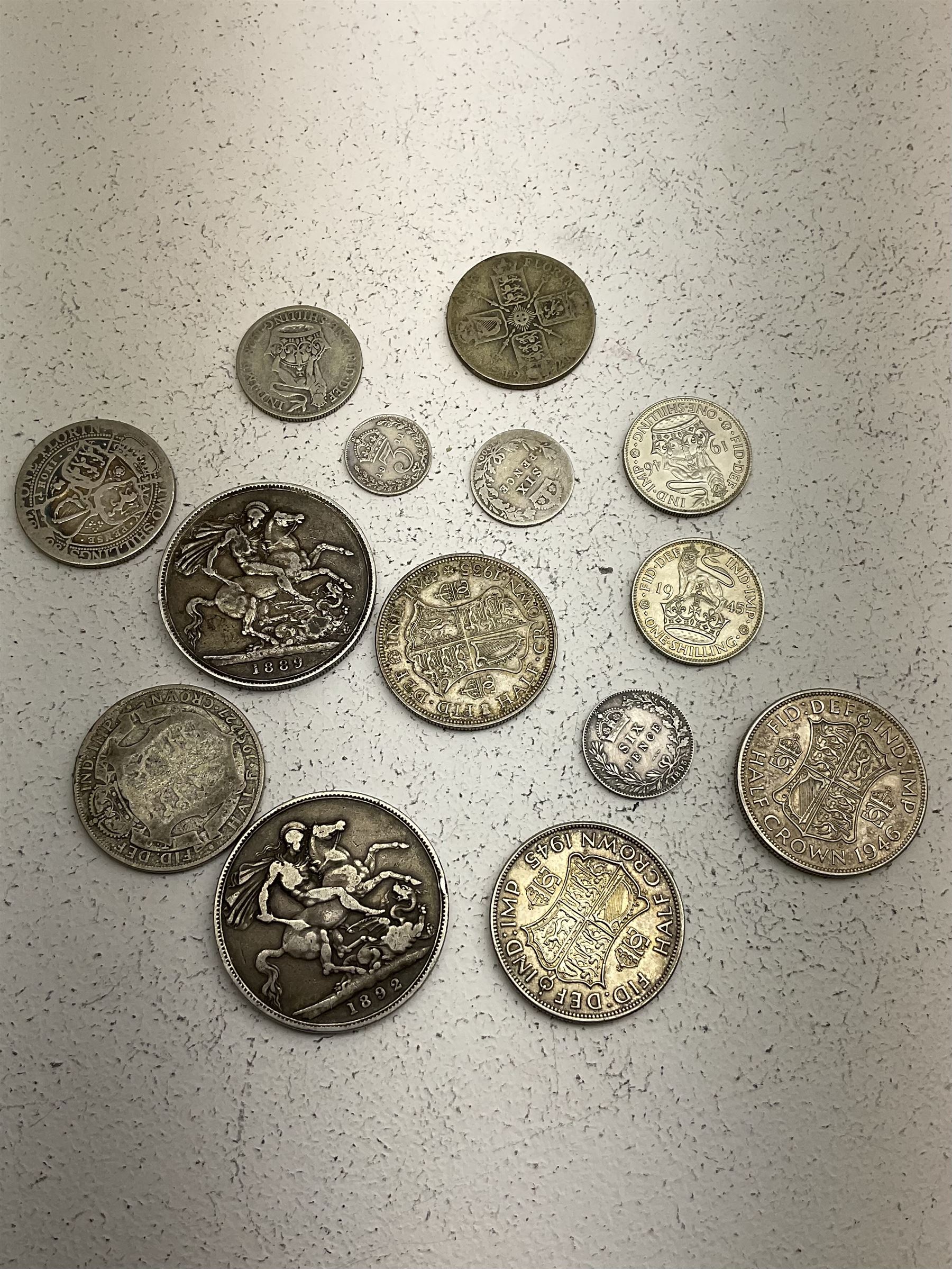 Two Queen Victoria silver crown coins dated 1889 and 1892, 1895 sixpence and small number of other pre 1920 coins and approximately 80 grams of Great British pre 1947 silver coins