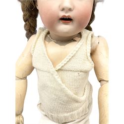 Simon & Halbig for Kammer & Reinhardt bisque head doll with applied hair, sleeping eyes, open mouth with teeth and composition body with jointed limbs H53cm; a hard plastic doll; and a boxed Corinthian 21 bagatelle board (3)