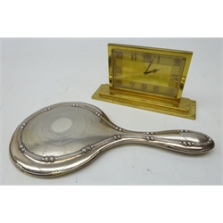  Art Deco 8-day dressing table clock, part engine turned gilt dial in brass stepped case and Art Deco sliver backed hand mirror by Boots Pure Drug Company, 1918 (2)  