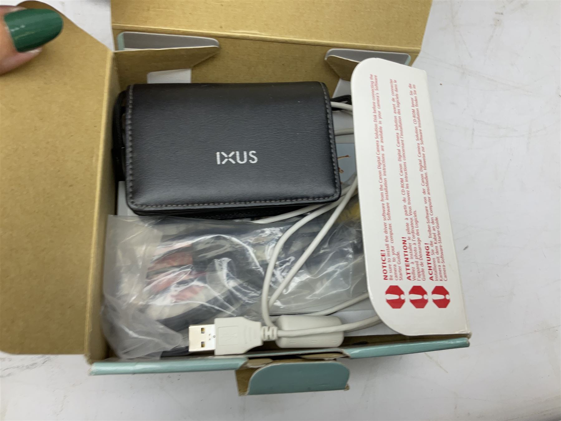 Minolta SRT101 camera, together with Halina camera, Fujifilm DX-8, Canon digital IXUS 1001S and other cameras and accessories 