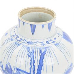 Pair of Chinese Kangxi blue and white porcelain vases, each of baluster form, painted with an outdoor scene containing figures seated upon the ground reading scrolls and holding fans, willow and bamboo tress, rock work and water, H27cm