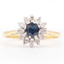 18ct gold sapphire and diamond cluster ring, single round cut sapphire surrounded by twelv...