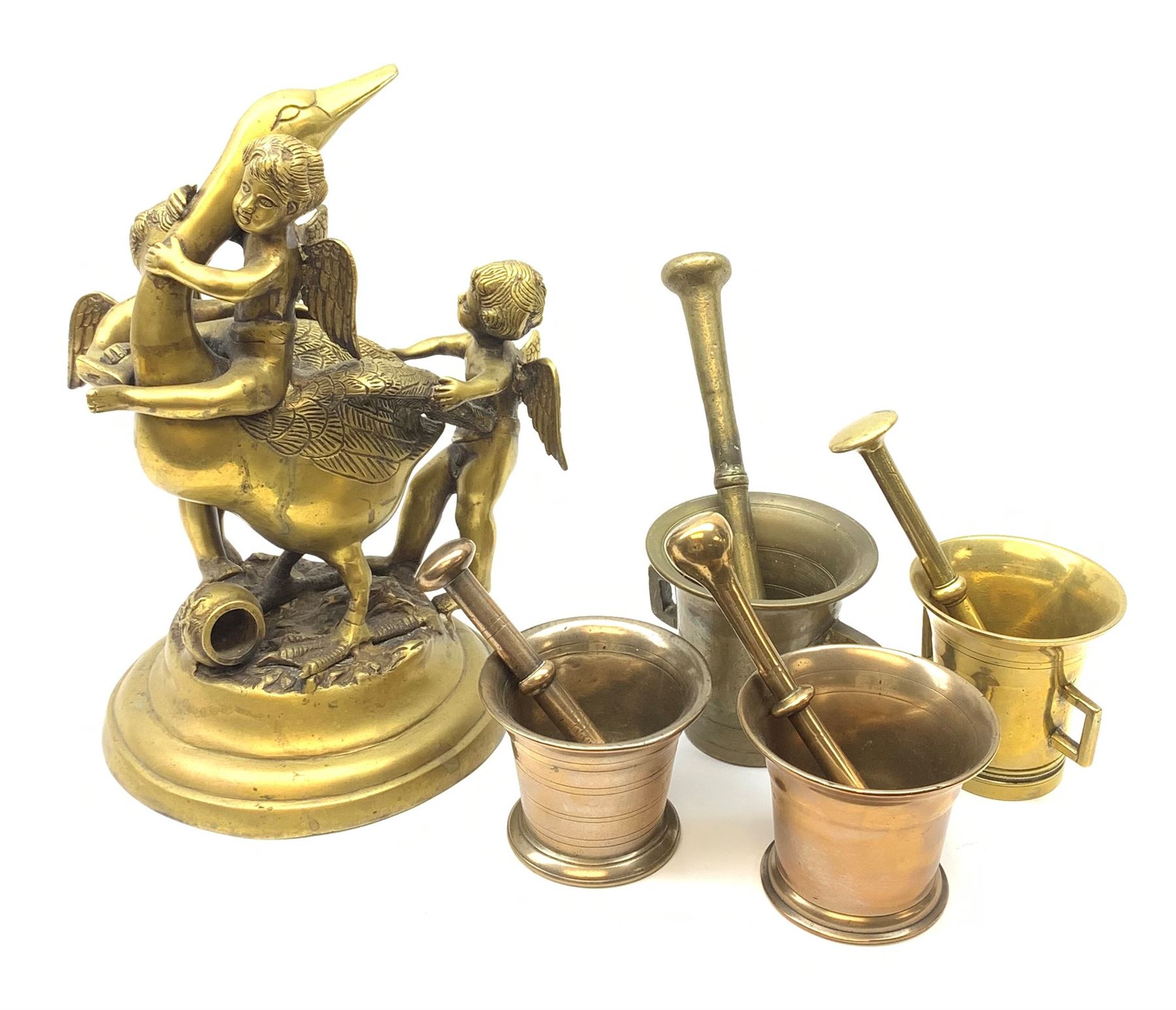 20th century brass sculpture group of three winged Cherubs with a Goose, H37cm together with four bronze pestle and mortars 