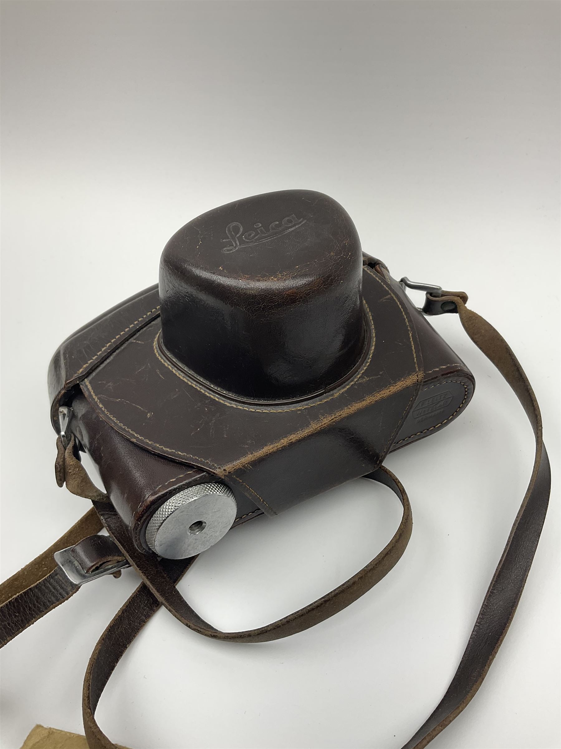 Leica M3 camera body, 1959, chrome finish, serial number '986937', fitted with 'Ernst Leitz GmbH Wetzlar Summicron f=5cm 1:2 Nr.1592614' lens, with Leica M3 instruction booklet