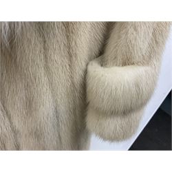 Marble blonde mink three quarter length coat and fox fur collar, with belt