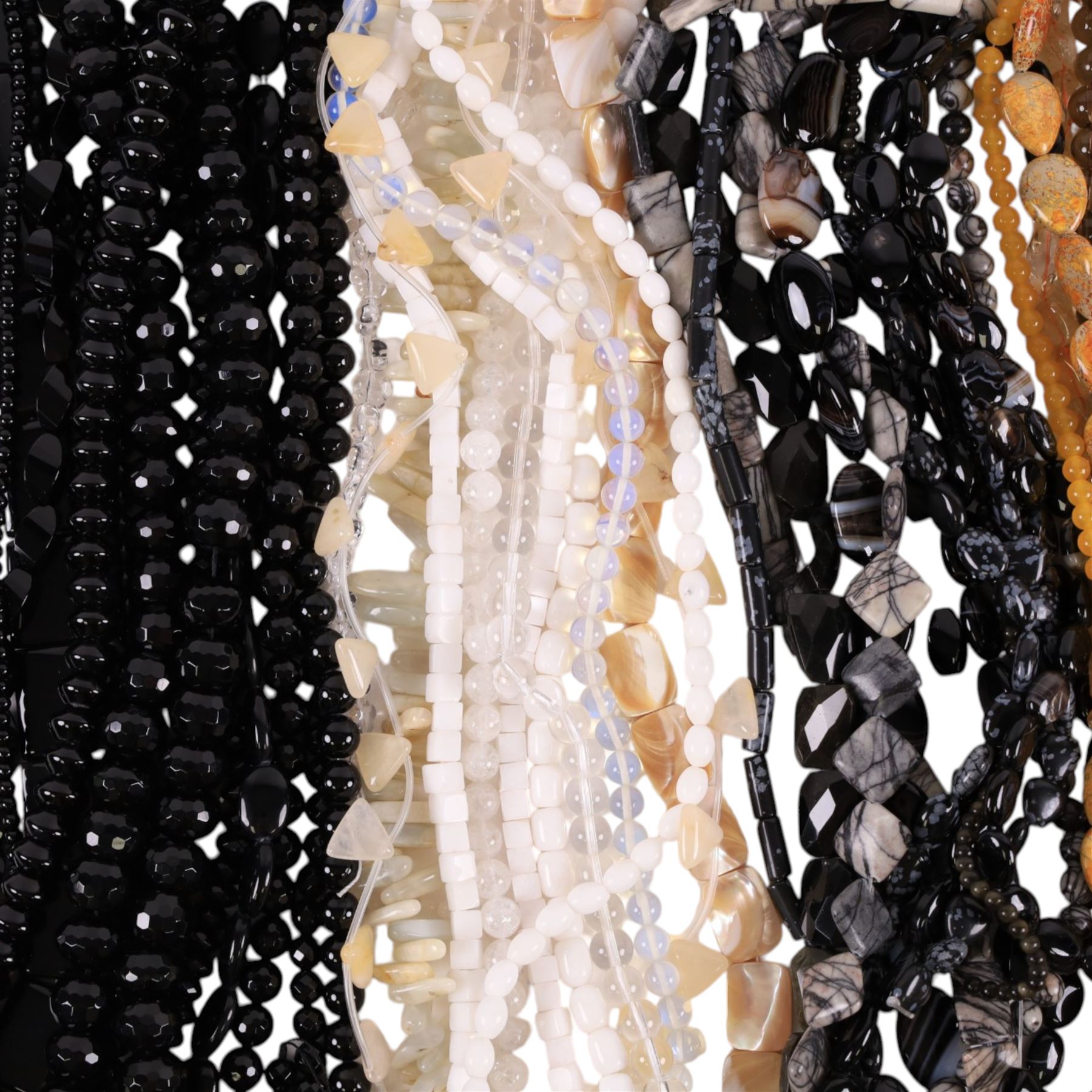 Seventy-six strings of polished gemstone and glass jewellery making beads and some loose beads, including black tourmaline quartz, sodalite, smoky quartz, mother of pearl, banded agate, jasper, maligano jasper, citrine, garnet etc, all of different cuts and sizes