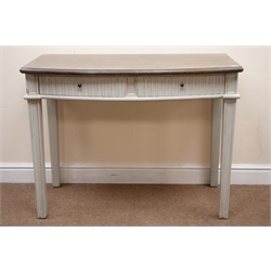  Painted bow fronted side table, two frieze drawers, square tapering supports, W100cm, H77cm, D52cm  
