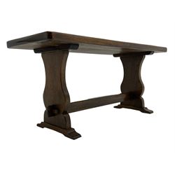 Rectangular oak coffee table, on shaped end supports joined by pegged stretcher (107cm x 40cm, H49cm), and a mahogany tripod wine table (D28cn, H51cm)