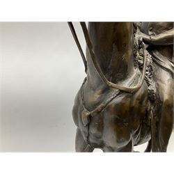 Large and impressive bronze figure of Wellington seated on a horse, on a sarcophogus shaped stepped base impressed 'Meunier Paris', the canted corners inset with battle trophies H68cm L50cm D22cm