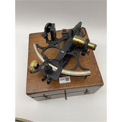 Henry Hughes & Son Ltd. sextant with black crackled finish, brass and silvered graduated arc and various coloured glass filters, serial no.60818, in fitted mahogany carrying box bearing Lilley & Reynolds Ltd. certificate dated 1962 W26cm