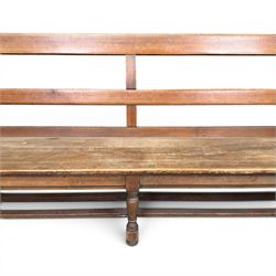 Early 20th century pine and oak bench seat, stained pine rail back frame with shaped oak arms