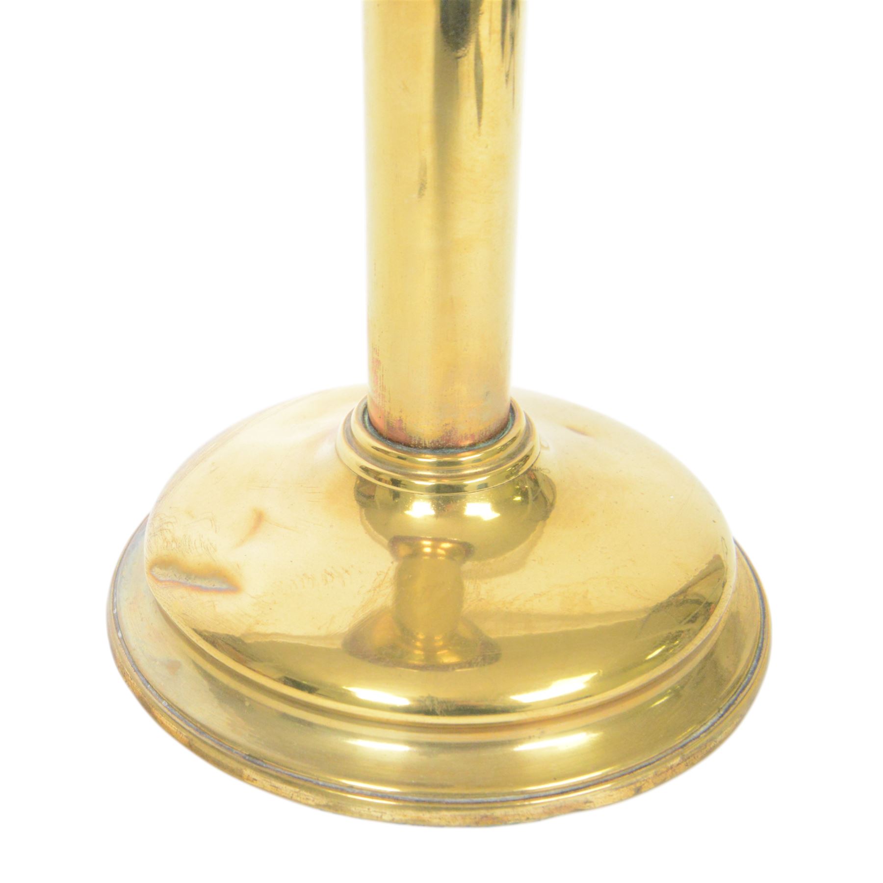 Victorian oil lamp, the brass base supporting a floral enamelled amethyst glass reservoir, duplex burner, and clear glass chimney, overall H69cm