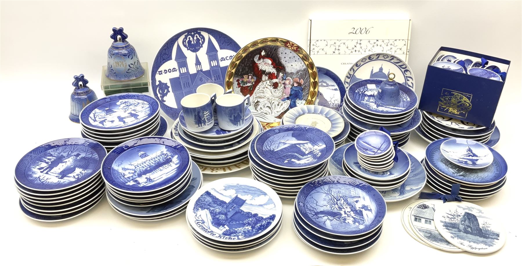 Royal Copenhagen thirty-eight assorted Christmas calendar plates, from 1963 to 1992, a selection of other Royal Copenhagen decorative plates, a collection of Bing and Grondahl plates, ceramic bells, etc. 
