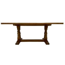 Mouseman - oak 6' refectory dining table, rectangular adzed and pegged top, two octagonal pillar supports on sledge feet joined by floor stretcher,  carved with mouse signature, by the workshop of Robert Thompson, Kilburn