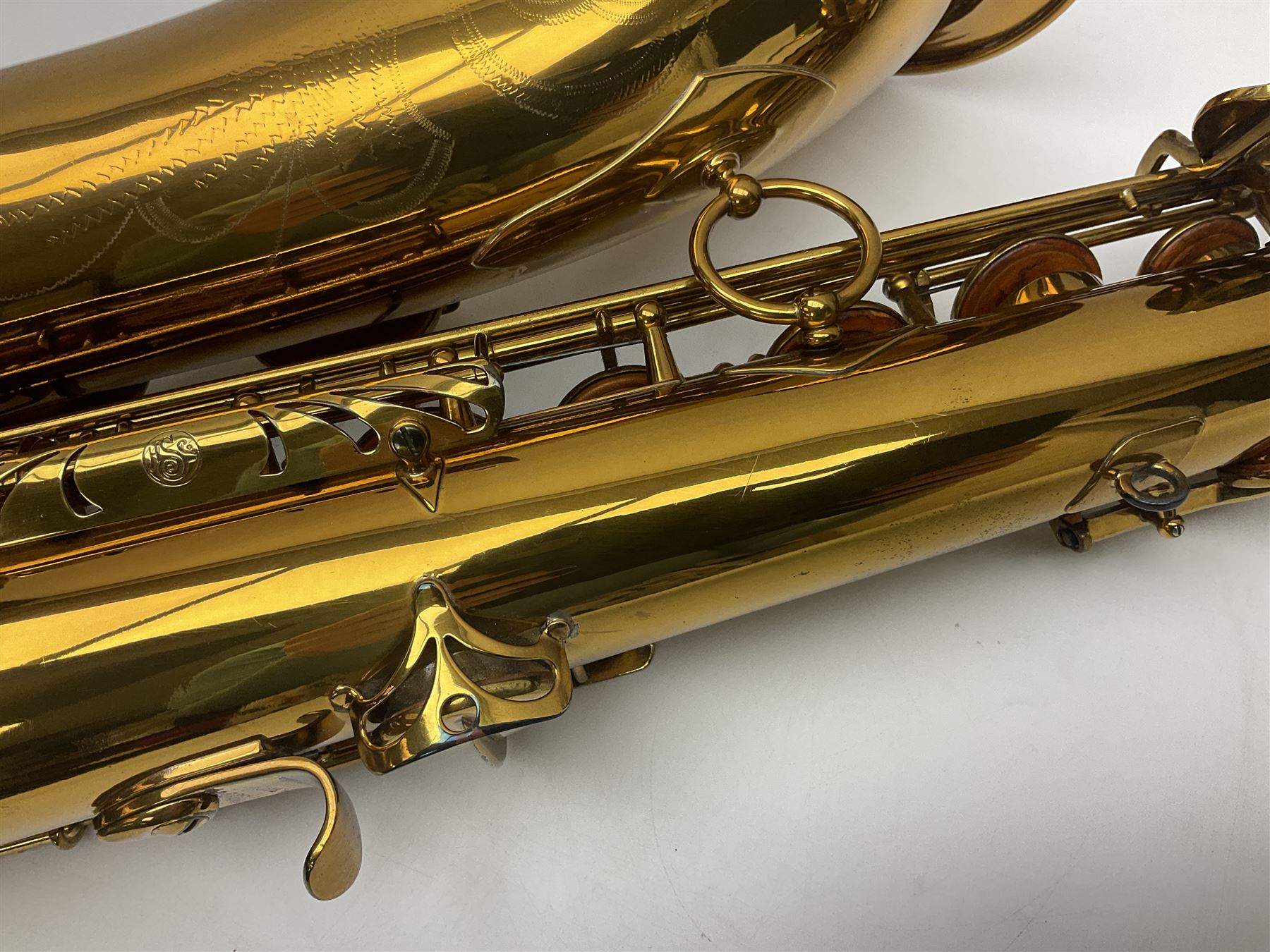 Mid-20th century French Henri Selmer Mark VI tenor saxophone, serial no.M.70644 for 1957, various French, English and American patent numbers, crudely stamped J.A.Brown twice to thumb rest; in fitted hard case with crook and other accessories including two Berg Larsen mouthpieces, reed cutter etc