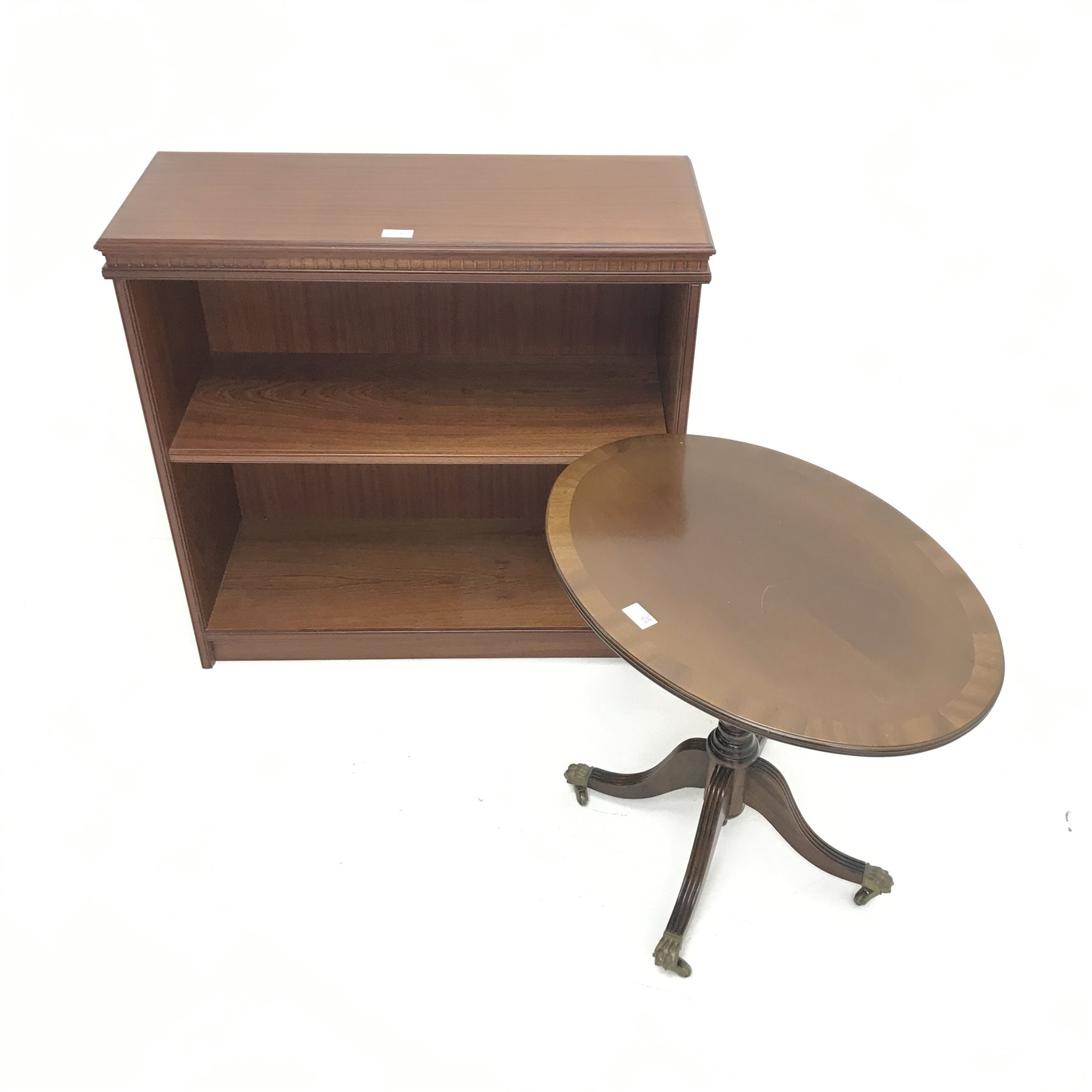 Sydney Smith narrow mahogany open bookcase, single shelf, platform base (W79cm, H75cm, D31cm) and a pedestal oval table (2)