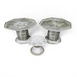 Two French early 20th century painted wicker octagonal garden tables, circular pedestals with parasol opening; with matching side table (3)