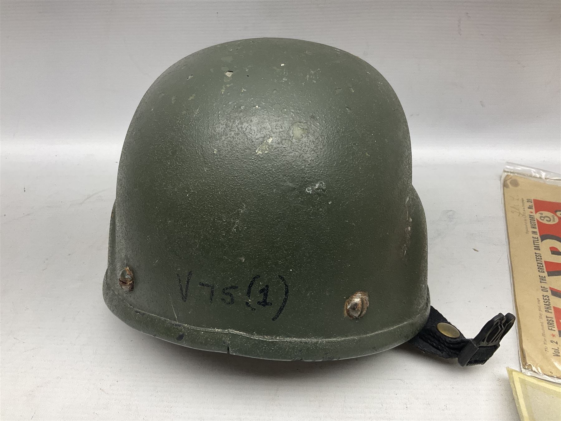 Bakelite cased Megger Insulation tester, by Evershed and Vignoles Ltd, Acton Lane Works, Chiswick, London W4, RW Munro Ltd air speed knots gauge, American green army helmet, The War Illustrated, WW2 aircraft photographic postcards, etc