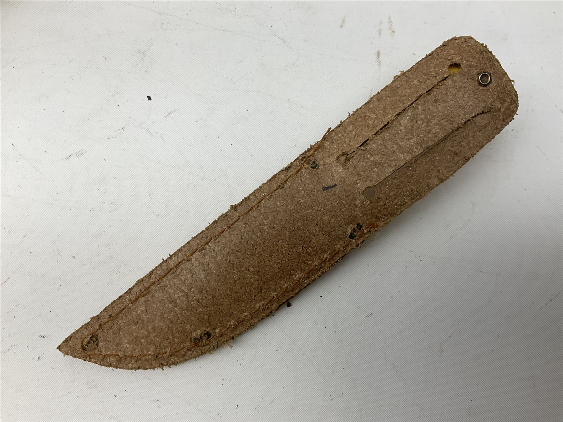 Graduated set of three Bowie knives by J. Nowill & Sons Sheffield England Est. AD1700, each with steel blade, brass cross-piece, stacked leather type grip and alloy pommel; largest blade 13cm and smallest 7.5cm; each in leather sheath (3)