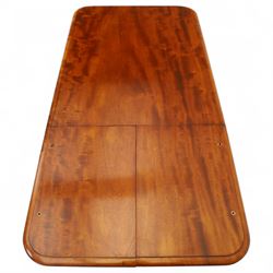 William IV mahogany reading table, the rectangular top with rounded corners and moulded edge, one end fitted with two hinged adjustable reading slops with two rests, the sliding top with a sprung stay mechanism, supported on a single tapered faceted column  with turned collar on a quatreform base with compressed bun feet
