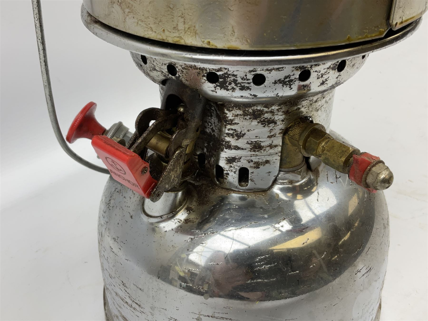 Copper and brass ship’s lamp marked ‘Anchor’, H25cm, Feuer hand storm lantern, Bialaddin Model 315 paraffin lamp and an Anchor lamp (4)