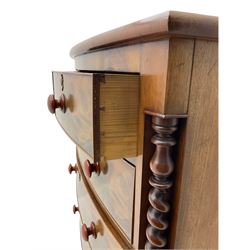 Victorian mahogany bow front chest, fitted with two short and three long drawers, turned barley twist pilasters
