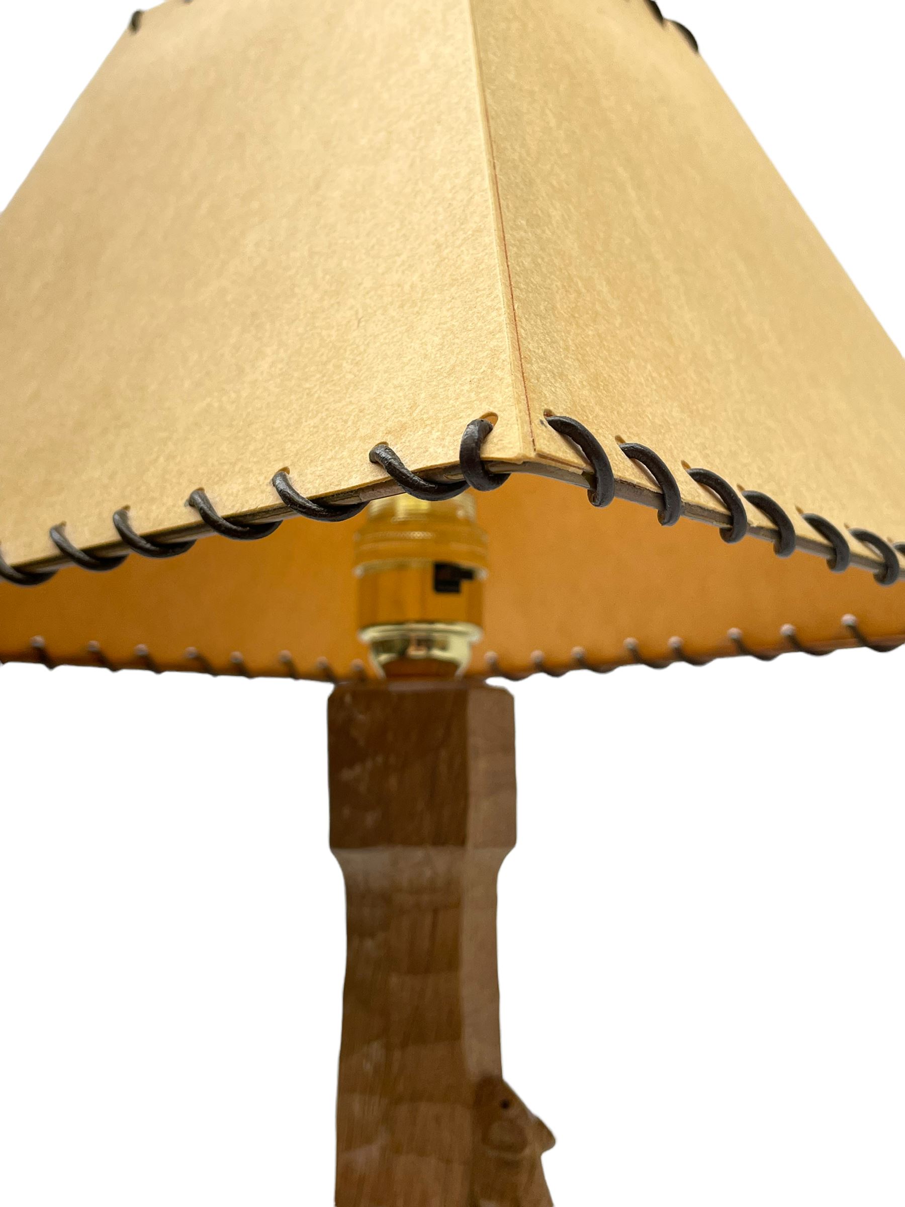 'Mouseman' tooled oak table lamp, the octagonal tapered stem carved with mouse signature, with shade, by Robert Thompson of Kilburn