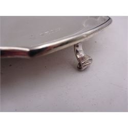 Modern silver salver, with shaped pie crust rim, upon four scroll feet, hallmarked L R Watson, Sheffield 1997, D21cm
