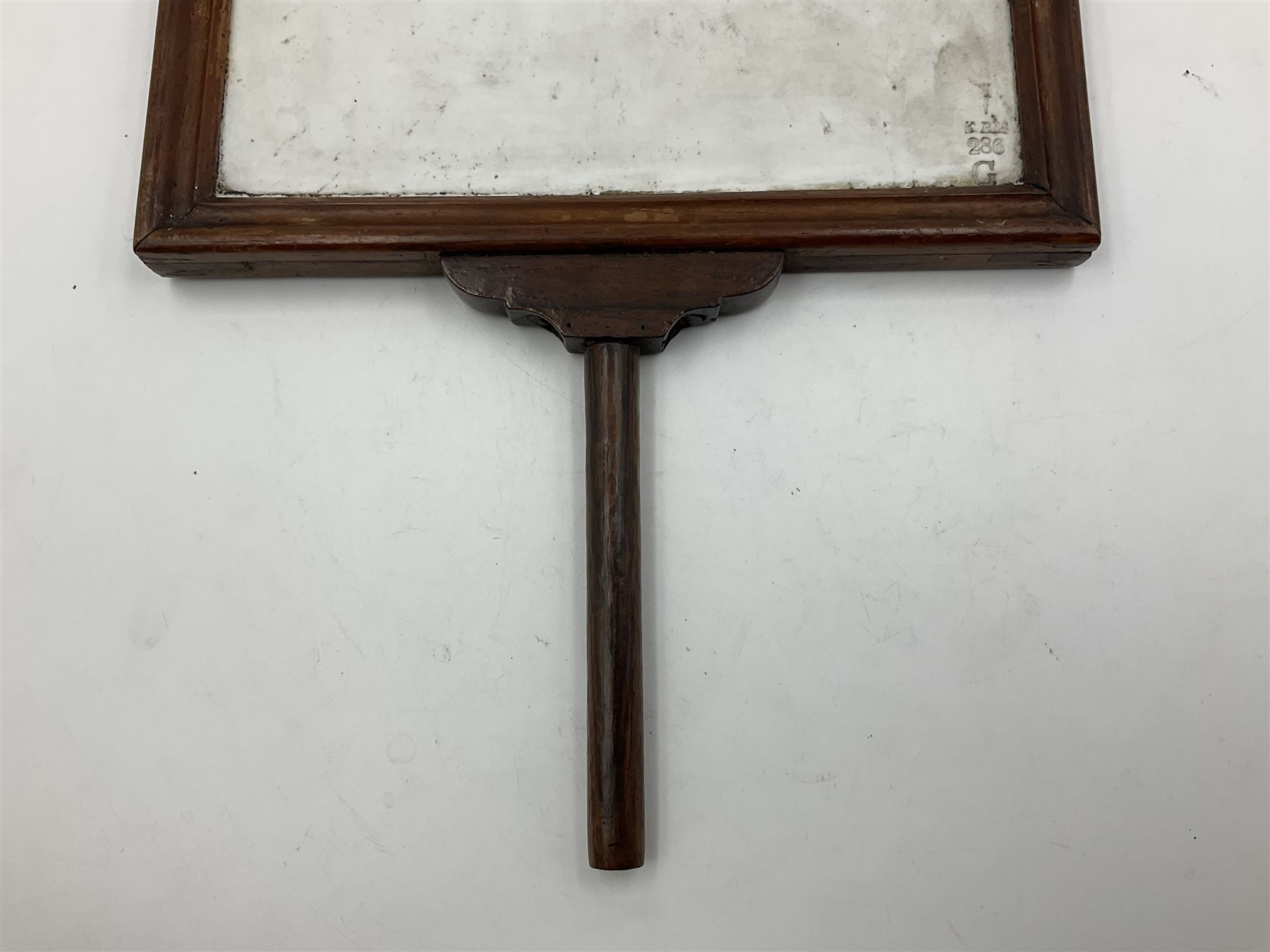 KPM Berlin lithophane panel, of two angels supporting a female figure to the centre, encased in a rosewood frame and handle, H42cm