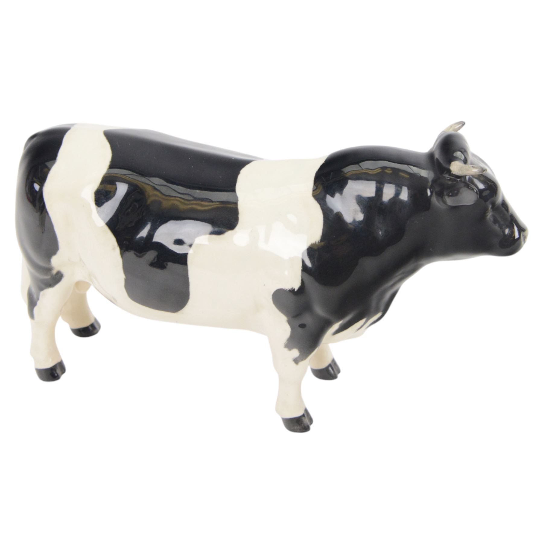 Beswick Friesian Cow family group, comprising Bull CH. Coddington Hilt Bar 1439, Cow CH. Claybury Leegwater 1362 and Calf 1249