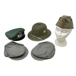 Five reproduction German WW2 hats comprising Wehrmacht olive tropical helmet, Heer officer's peaked cap, two M43 caps and Field side cap (5)
