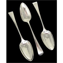 Three George III silver Old English pattern table spoons, with engraved monogram to terminals, hallmarked Peter, Ann & William Bateman, London 1803, approximate total weight 5.65 ozt (176 grams)