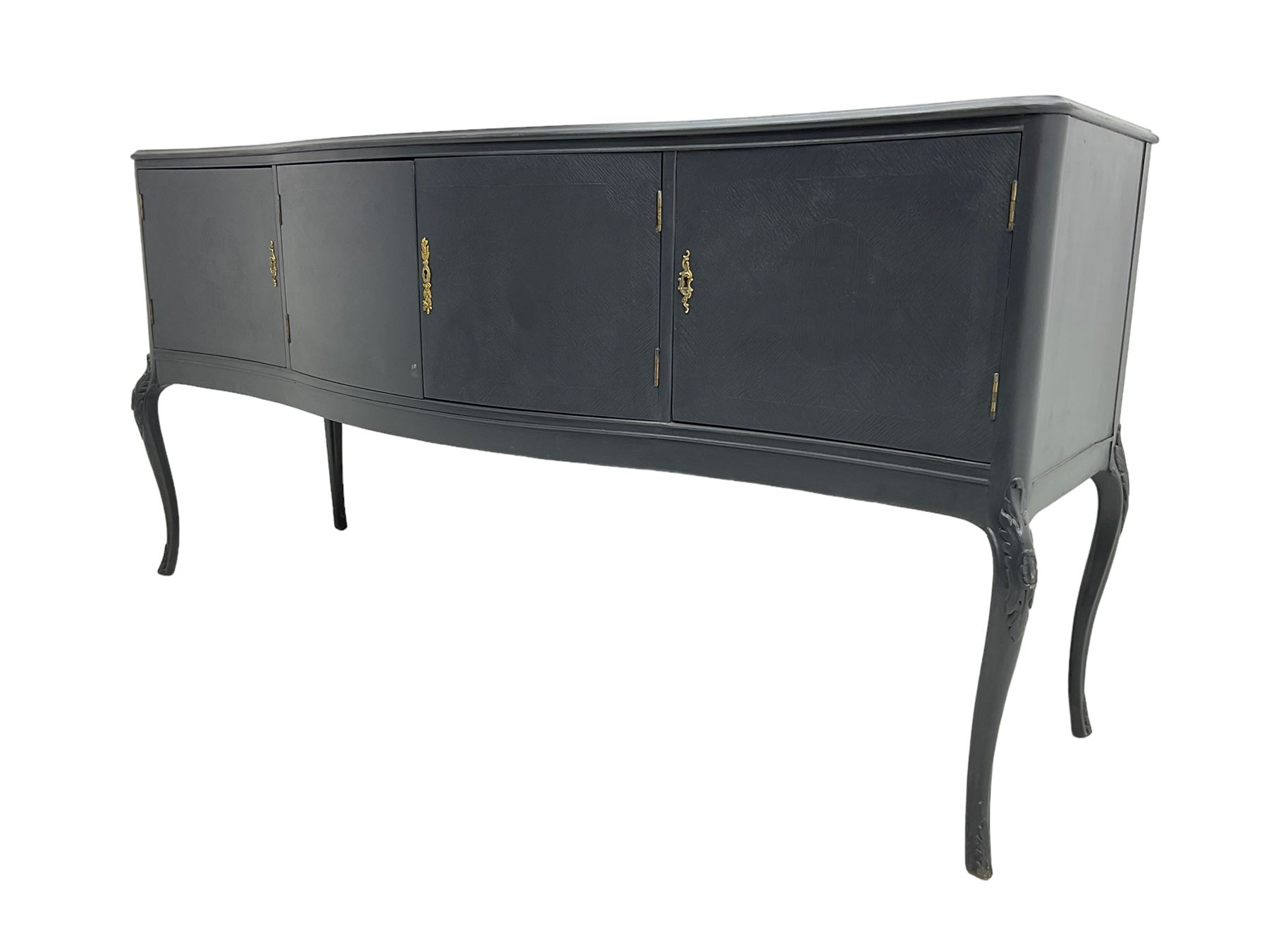 French design grey painted teak serpentine sideboard, the shaped front fitted with central double cupboard flanked by two single cupboards, each concealing drawer, on cabriole supports