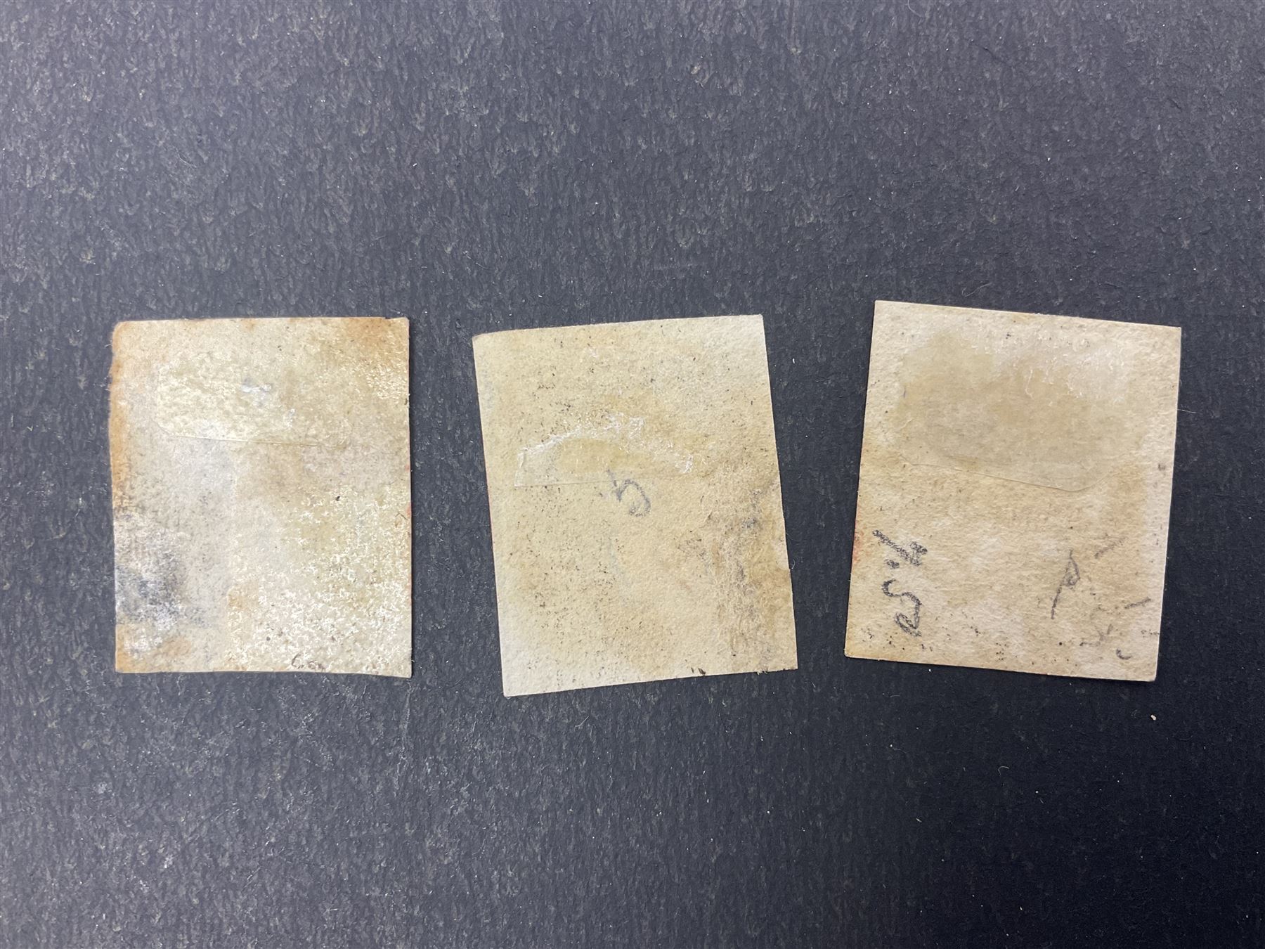 Three Great Britain Queen Victoria penny black stamps, all with red MX cancels