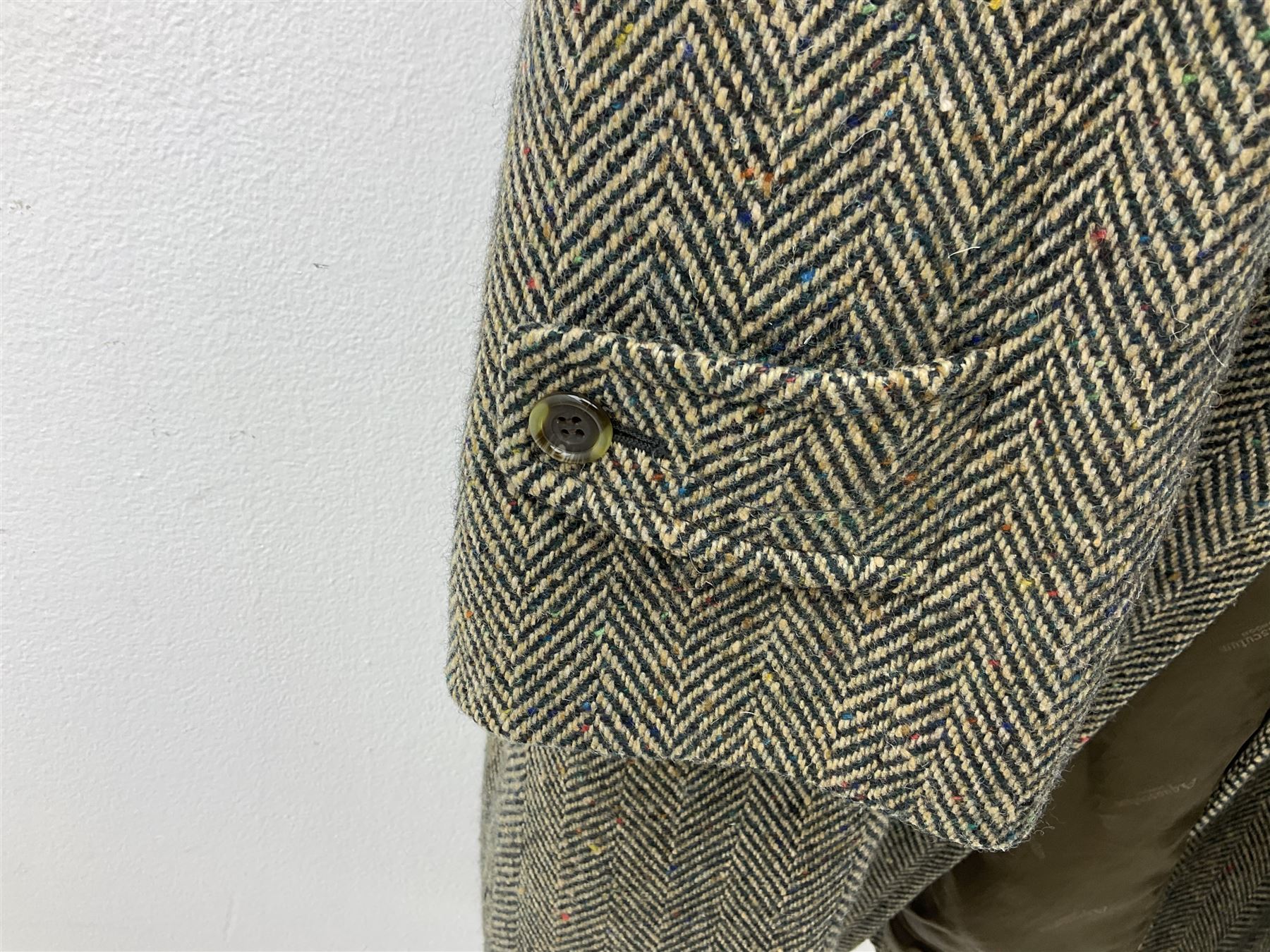 Men's Aquascutum lambs wool herringbone tweed coat with silk lining, 46 Reg, together with a further Men's Aquascutum grey wool duffle coat, with cheque lining and horn buttons, 46