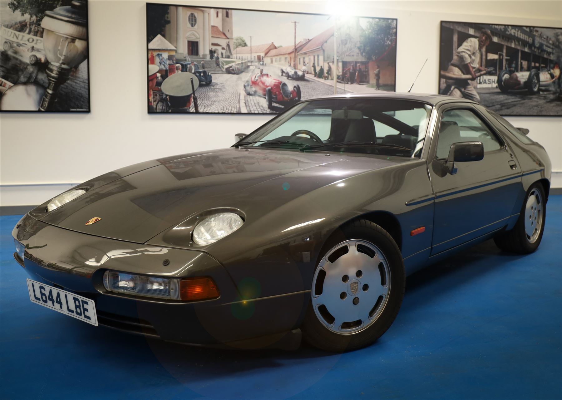 1991 Porsche 928 S4 Automatic Coupé

Registration: L644 LBE
Date of first registration as shown on V5: 1 July 1994
Porsche year of manufacture: 1991
Engine: 5.0-litre V8 petrol
Transmission: Automatic
Odometer reading: 37,886 kilometres (approximately 23,541 miles)
Colour: Slate Grey metallic
Interior: Black leather
V5C: Present
Keys: One
Chassis number: WP0ZZZ92ZMS800460

An exceptional Porsche 928 S4 Automatic Coupé finished in Slate Grey metallic with a black leather interior. The car displays a notably low odometer reading of just 37,886 kilometres, equivalent to approximately 23,541 miles.

The 928 S4 combined Porsche’s powerful 5.0-litre V8 engine with a sophisticated rear-mounted transaxle, creating a refined and accomplished grand tourer. This example is equipped with automatic transmission, electrically adjustable front seats, air conditioning, alloy wheels and the characteristic rear spoiler.

The car was purchased from Specialist Cars of Malton in June 2019, at which time the recorded mileage was 36,650 kilometres. The accompanying service record includes evidence of a cam belt replacement.

Presented in excellent condition throughout, the bodywork and metallic paint finish appear particularly well preserved, while the cabin retains its original character with black leather upholstery and 928-branded sill trims. A Japanese Porsche service label records maintenance entries at 31,902, 33,397 and 34,134 kilometres.

The car also features a Porsche Classic Communications Management (PCCM) upgrade system.

Features

• 5.0-litre V8 petrol engine
• Automatic transmission
• Slate Grey metallic paintwork
• Black leather interior
• Electrically adjustable front seats
• Air conditioning
• Porsche alloy wheels
• Rear spoiler
• Right-hand drive
• Odometer reading of 37,886 kilometres, approximately 23,541 miles
• Purchased from Specialist Cars of Malton in June 2019
• Recorded at 36,650 kilometres when purchased
• Service record showing cam belt replacement
• Japanese Porsche service label
• V5C present
• One key

This vehicle forms part of the Estate of the Late John Sils and is offered for sale by the Executors, confirming a genuine reason for sale.