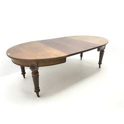 Late Victorian mahogany extending dining table, two leaves, on turned tapering flower head column supports 