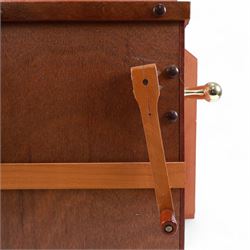 John Smith-20th century hand cranked portable street organ “music and mirth” in a wooden case with carrying handles, with speaking pipes and mannequin to the front. All pipes present, however the mechanism is in need of restoration. With five paper music rolls.