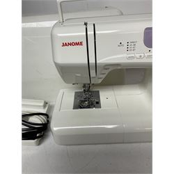 Janome sewing machine in case 