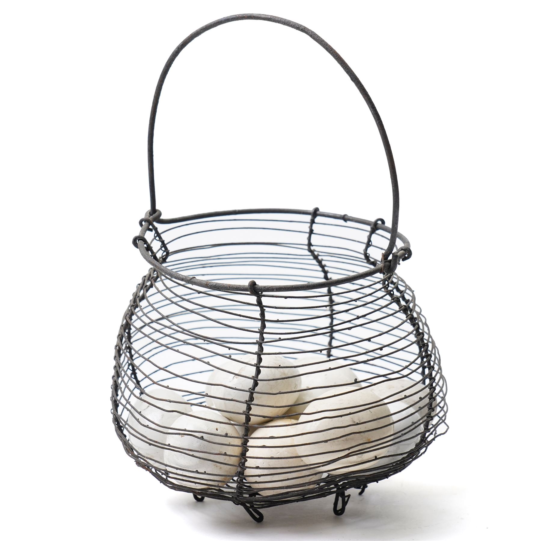 Two wire crocks, each containing 11 broody hen ceramic dummy eggs, four marked 'Caperns'