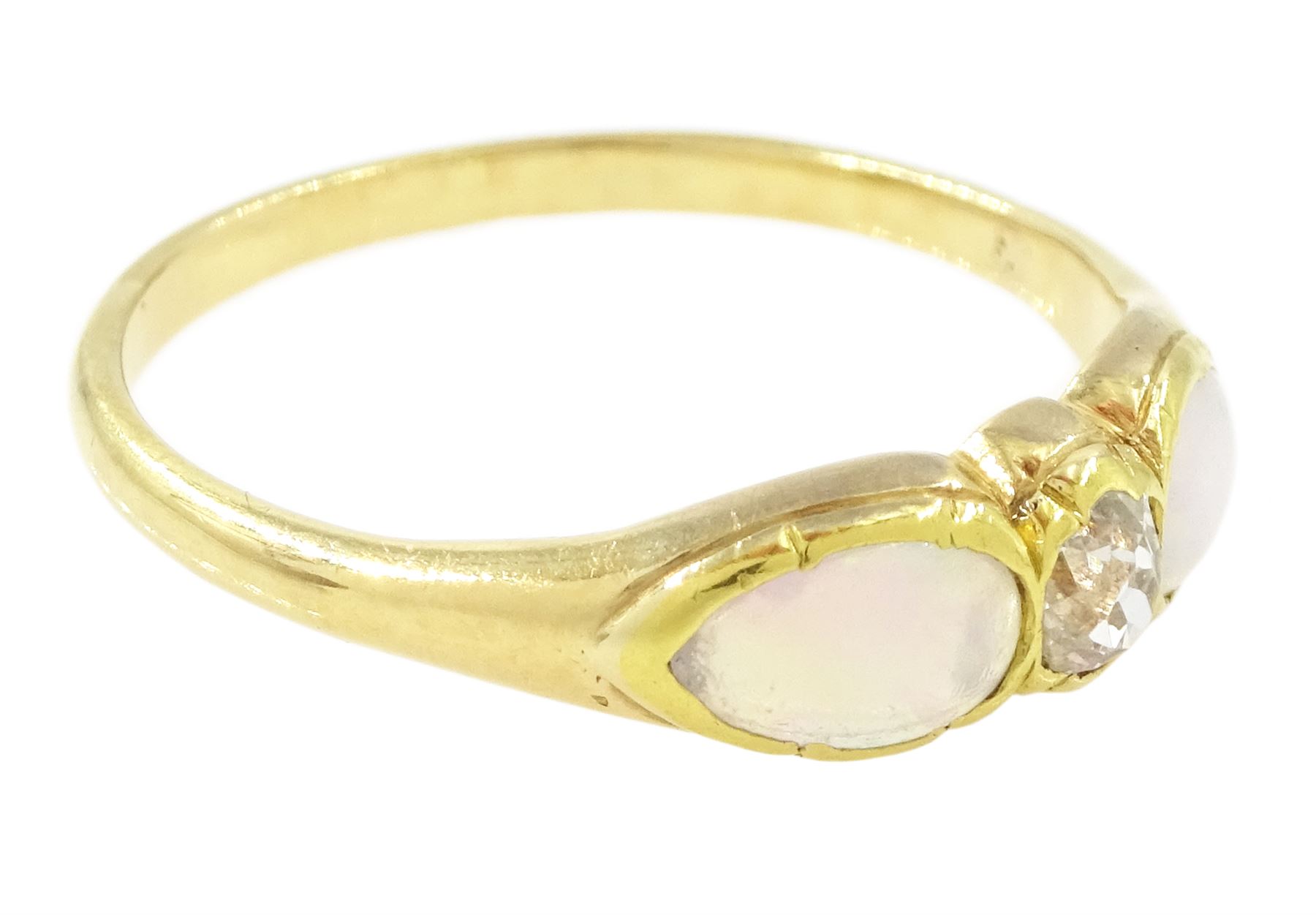 Early 20th century gold opal and diamond three stone ring, single old cut diamond of approx 0.10 carat, with a single cabochon pear cut opal set either side