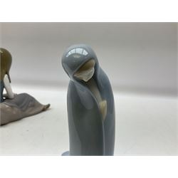 Four Lladro figures, comprising Afternoon Promenade no 7636, Nostalgia no 5071, both with original boxes, Girl with Lilies no 4972 and Madonna no 4534, largest example H27cm