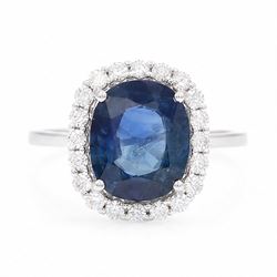 18ct white gold sapphire and diamond cluster ring, single cushion cut sapphire of approx 4...