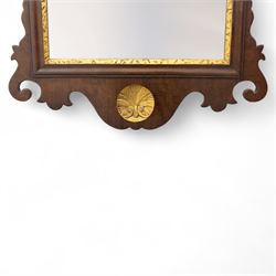 George III mahogany side table, the rectangular moulded top above a single frieze drawer fitted with brass swan neck handles, above a shaped serpentine apron raised upon square section legs, W86 D42 H75cm, together with a George III fretwork mirror, the rectangular plate within a gilt slip surmounted by a pierced crest with inset carved Ho-Ho bird, with shaped apron with gilt shell motif, H84cm W45cm