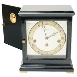 Three 20th century 8-day spring driven mantle clocks and a 20th century brass cased ships clock with a sweep seconds hand.