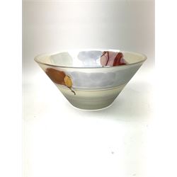 Four pieces of modern Art Glass, comprising three vases, one of slightly ovoid form, another of tapering cylindrical form, and the third of trumpet form, tallest H29.5cm, and a flared bowl, D27cm, each with merging brown decoration. 