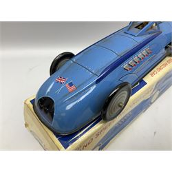 Schylling Collector Series clockwork tin-plate Sir Ian's Bluebird Land Speed Record Car with key and paperwork No.006080; boxed; and clockwork silvered tin-plate model of an 0-6-0 locomotive; unboxed (2)