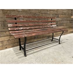 Wrought metal and wood slatted garden bench