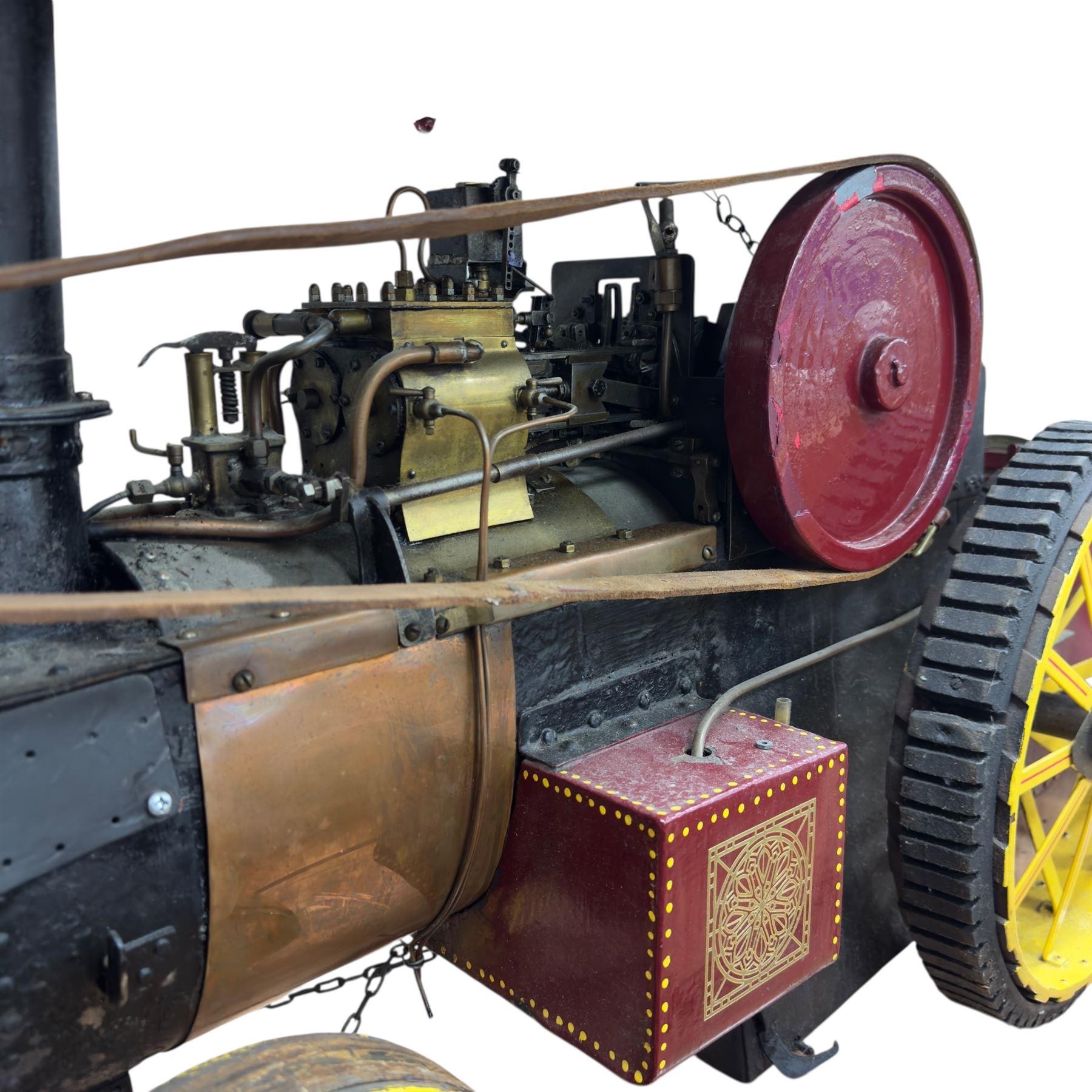 Mid-20th century scratch-built red and yellow painted live-steam scale model of a Showman's Traction Engine, 'Supreme' S.A. Oates & Sons, the simulated full length planked wooden canopy with brass supports and rope edging, with regulator, hand brake, chain steering , dynamo and water feed controls 19cm flywheel, 32cm diameter rear wheels with solid rubber tyres and 21cm diameter front wheels L102cm; together with scratch-built ride-on two-wheel trailer L58cm, and various brass rally plaques for 1980s/1990s.
This is a large, most interesting and comprehensive live-steam working model in need of re-furnishment and some repairs, the boiler has not been tested.